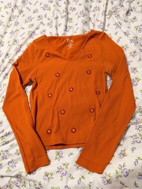 Orange Ribbed V-Neck Long Sleeve Top with Daisy Embroidery